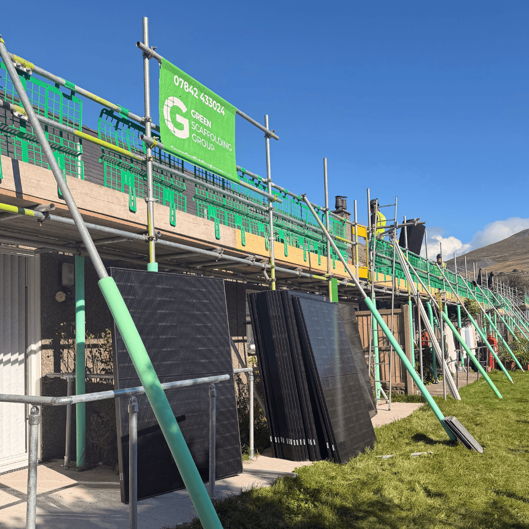 Green Scaffolding Group scaffold providing roof access for a solar panel installation